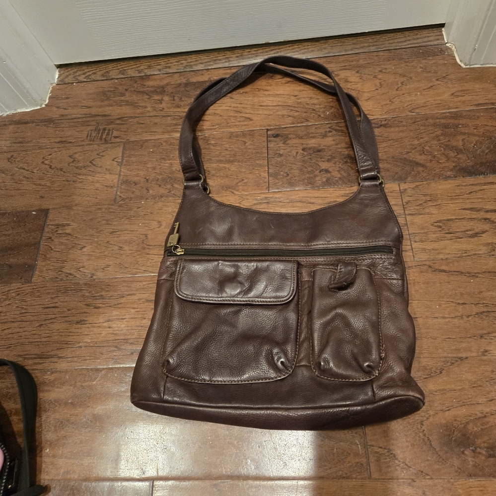 Fossil brown leather saddlebag style purse.